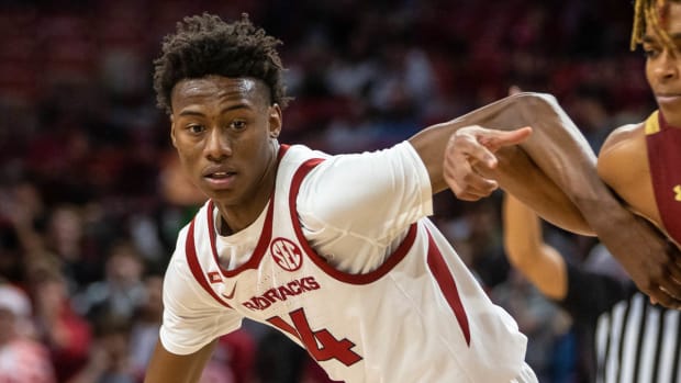 Jaxson Robinson looks to drive against Elon in a game on Dec. 21, 2021 against Elon.